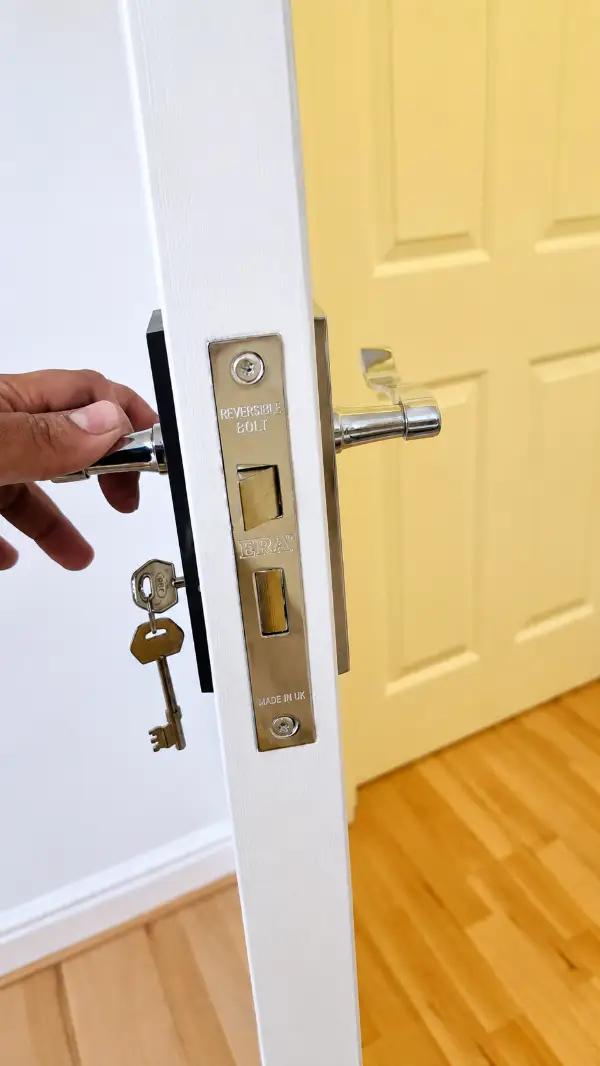 ERA sashlock installed on an internal wooden door by Bluesaki Locksmiths in Peckham, London, with new door handles fitted and lock fully tested.