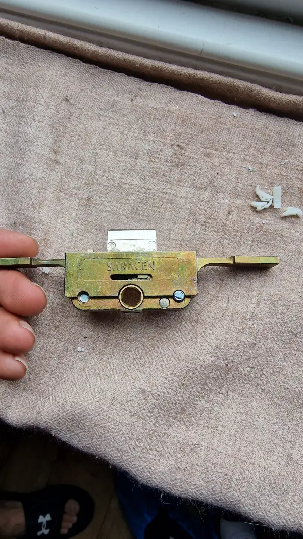 Broken Saracen window locking mechanism removed for repair and replacement by Bluesaki Locksmiths in Bromley, London.
