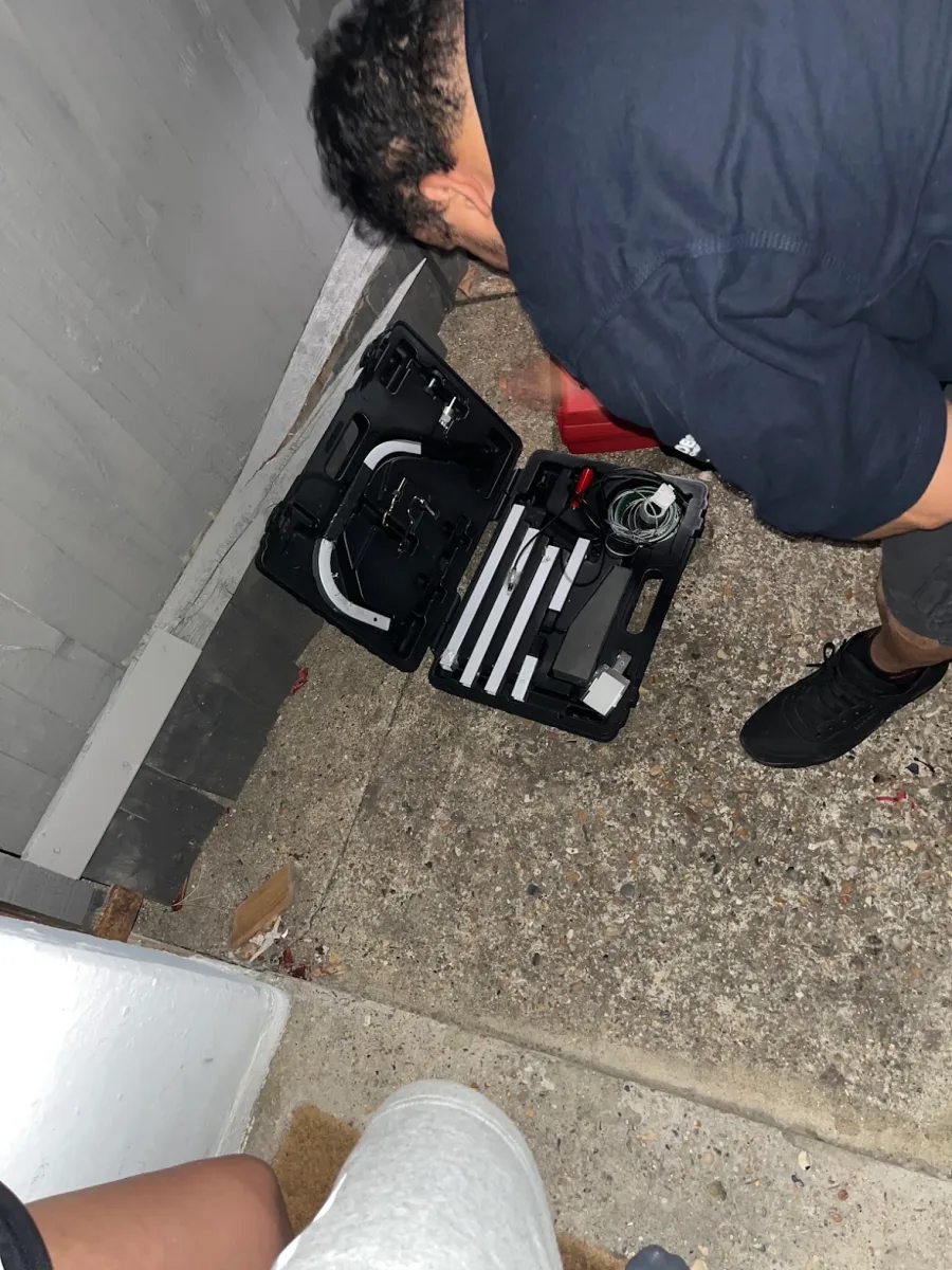 Bluesaki locksmith using non-destructive entry tools on a front door